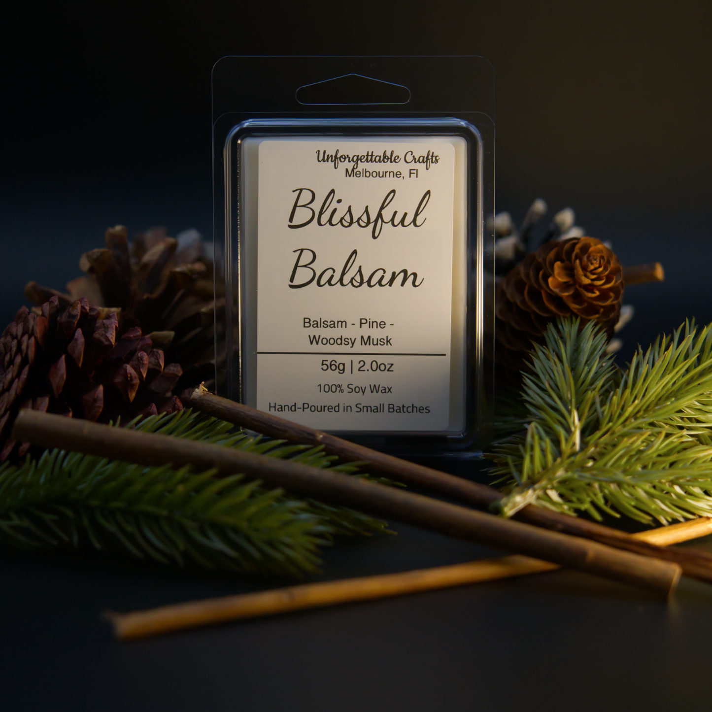 Wax melt package labeled 'Blissful Balsam' with decorative elements on a dark background