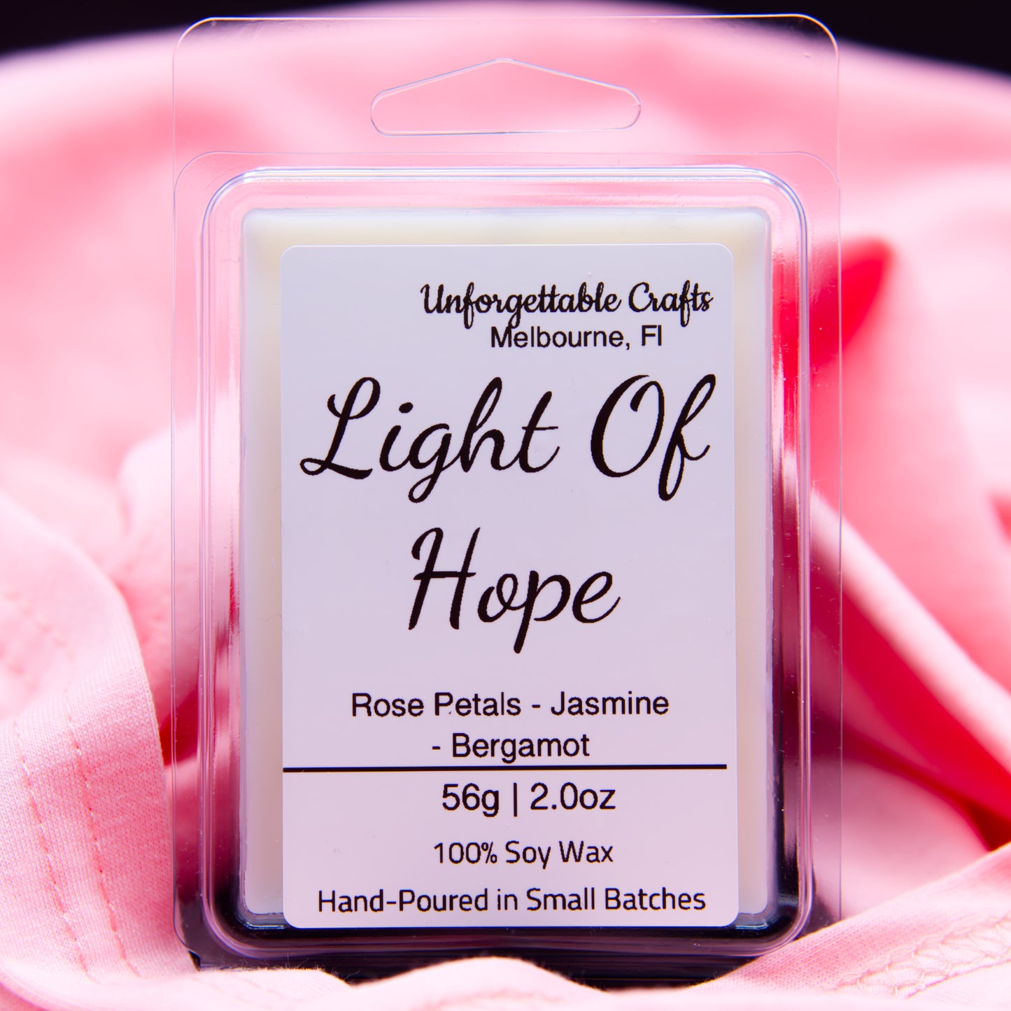 Wax melt package labeled 'Light Of Hope' with a pink floral background
